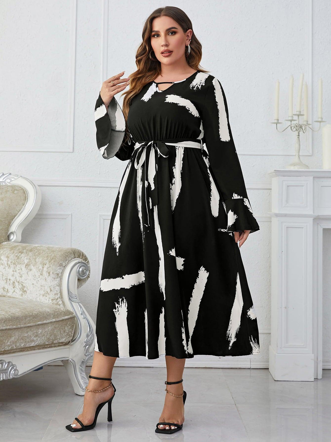 Melo Apparel Plus Size Printed Tie Belt Flare Sleeve Round Neck Midi Dress - Lucianne Boutique