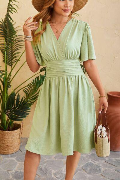 Ruched Surplice Short Sleeve Dress - Lucianne Boutique