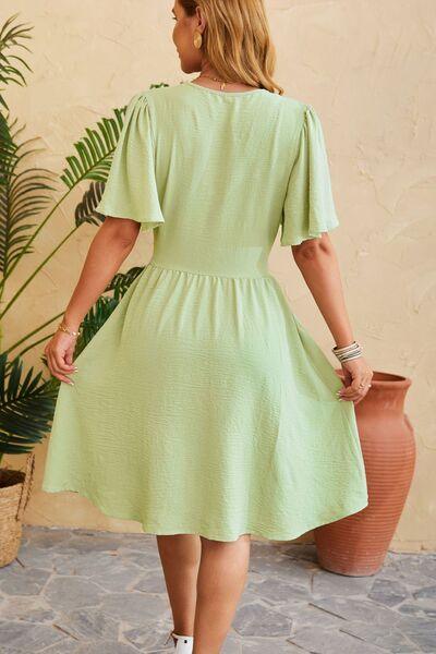 Ruched Surplice Short Sleeve Dress - Lucianne Boutique