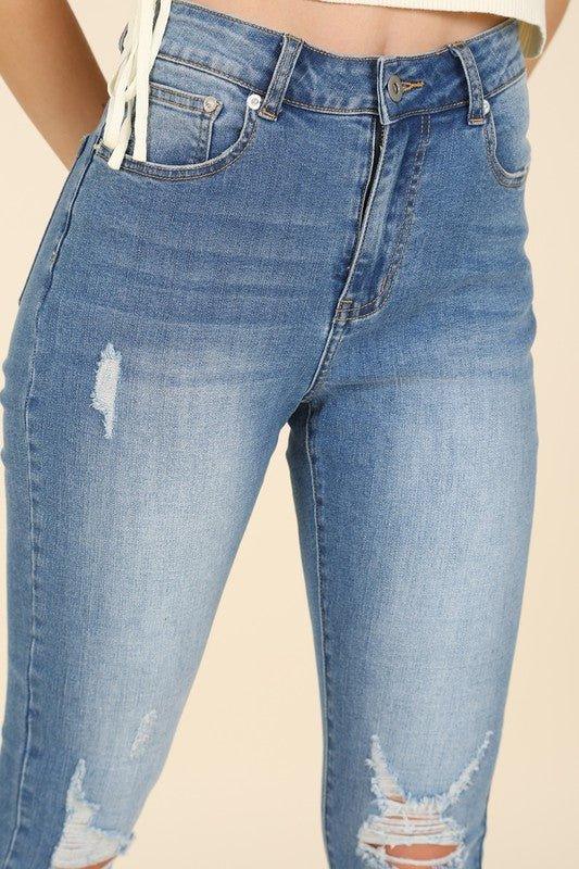 Dark wash distressed skinny jeans - Lucianne Boutique